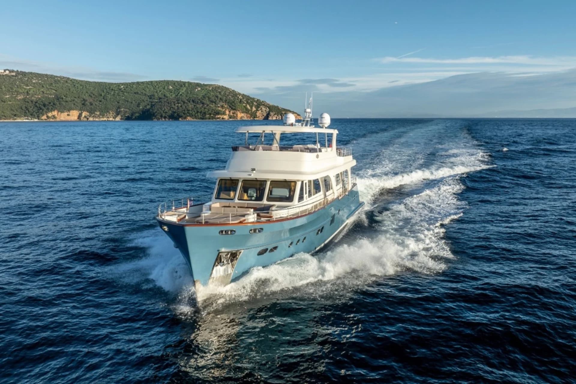 Empire running bow-first across open water.