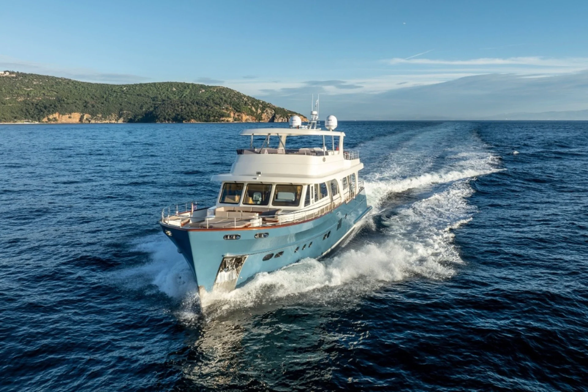 Empire running bow-first across open water.