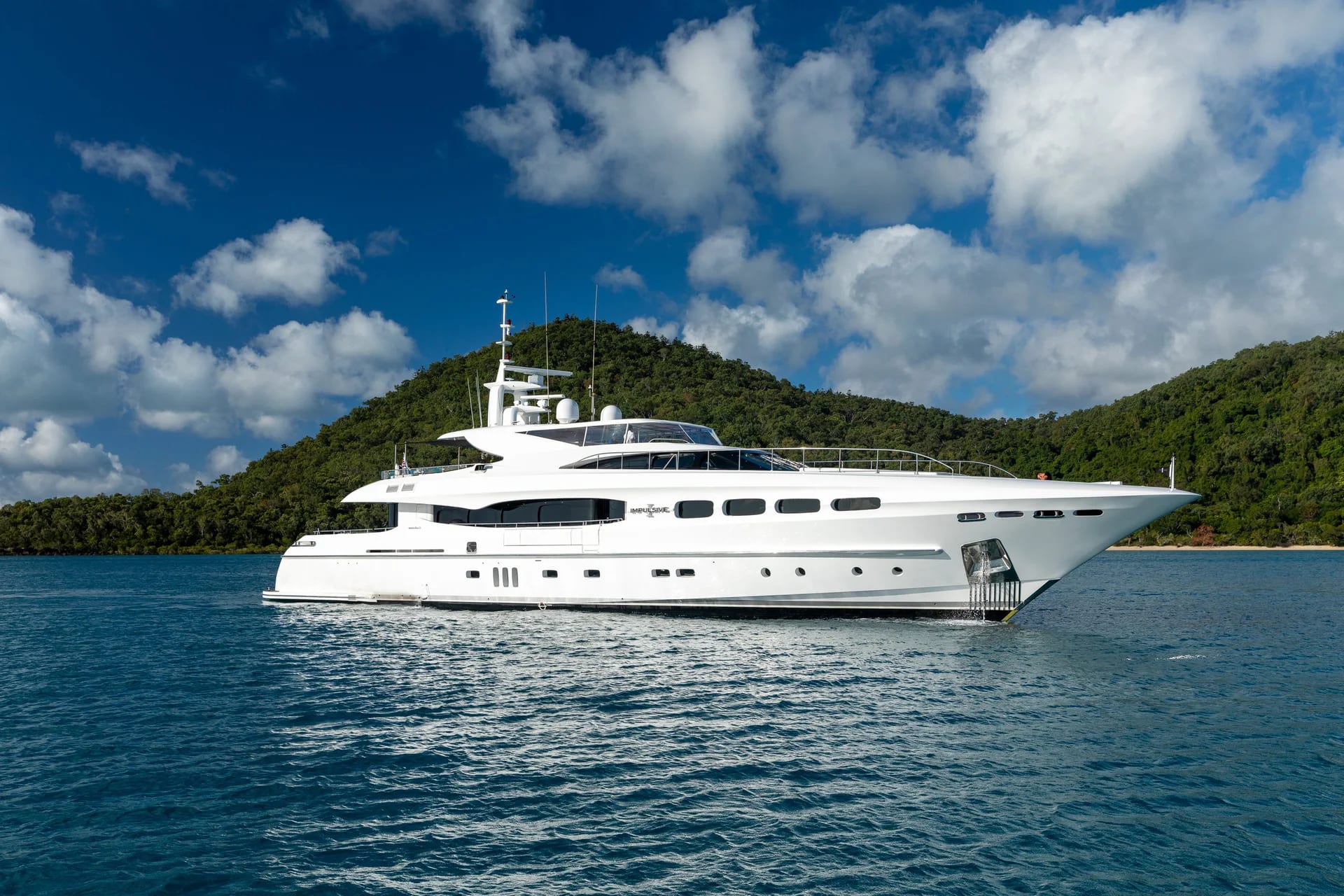Impulsive viewed broadside on turquoise water.