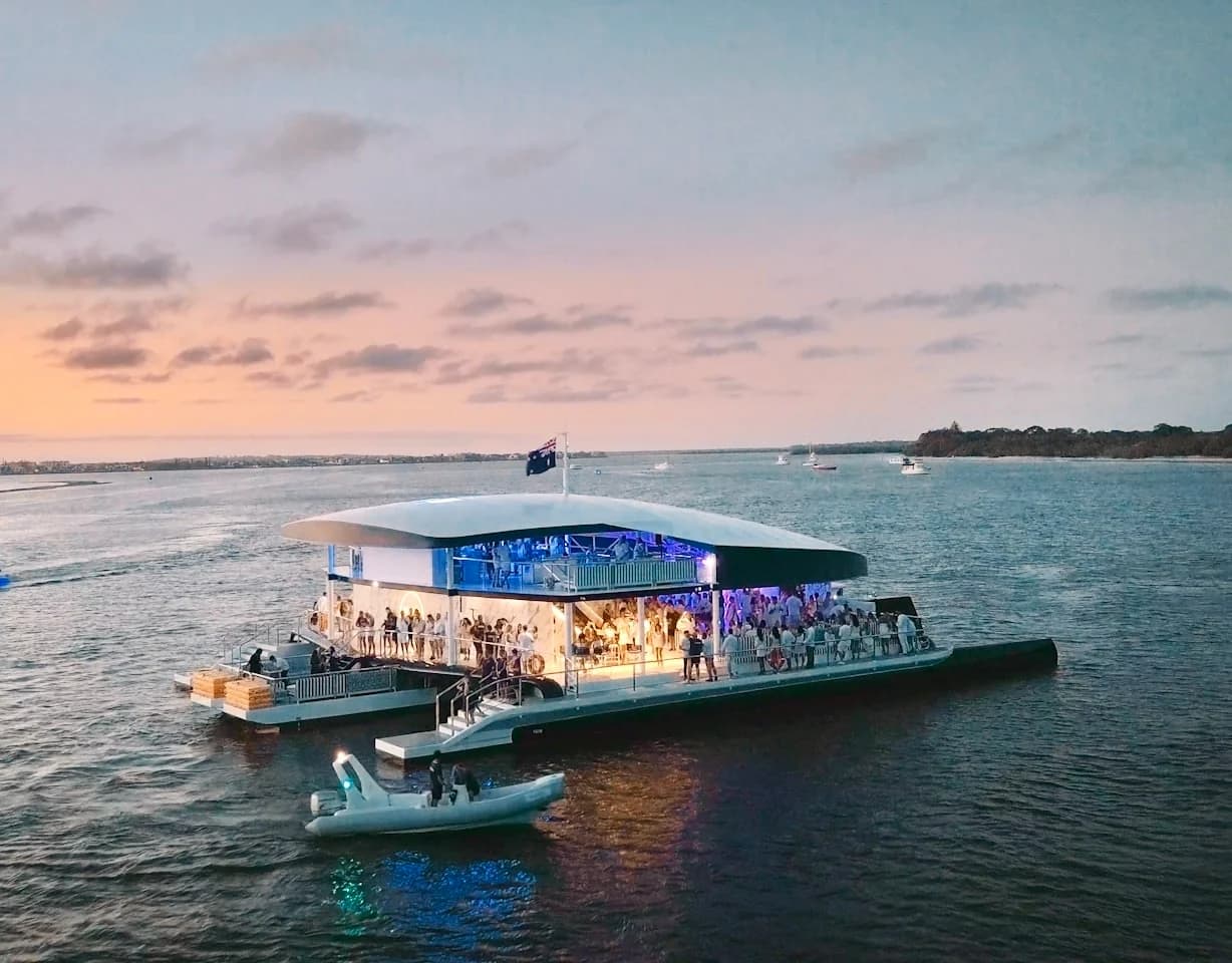 YOT Club on the water at dusk