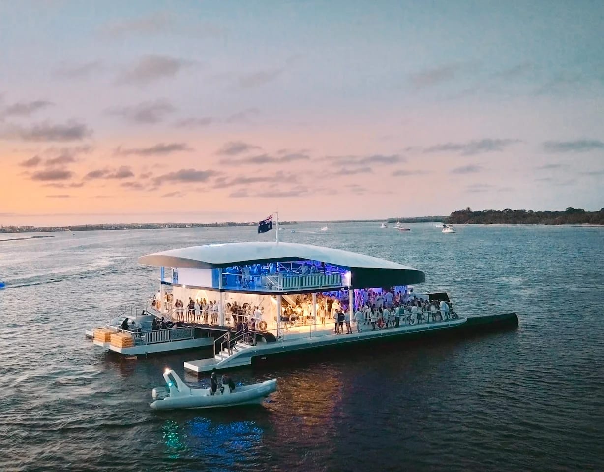 YOT Club on the water at dusk